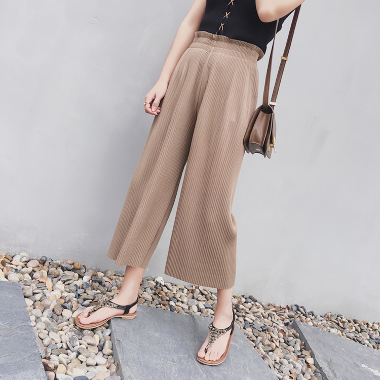 штани з плісировкою